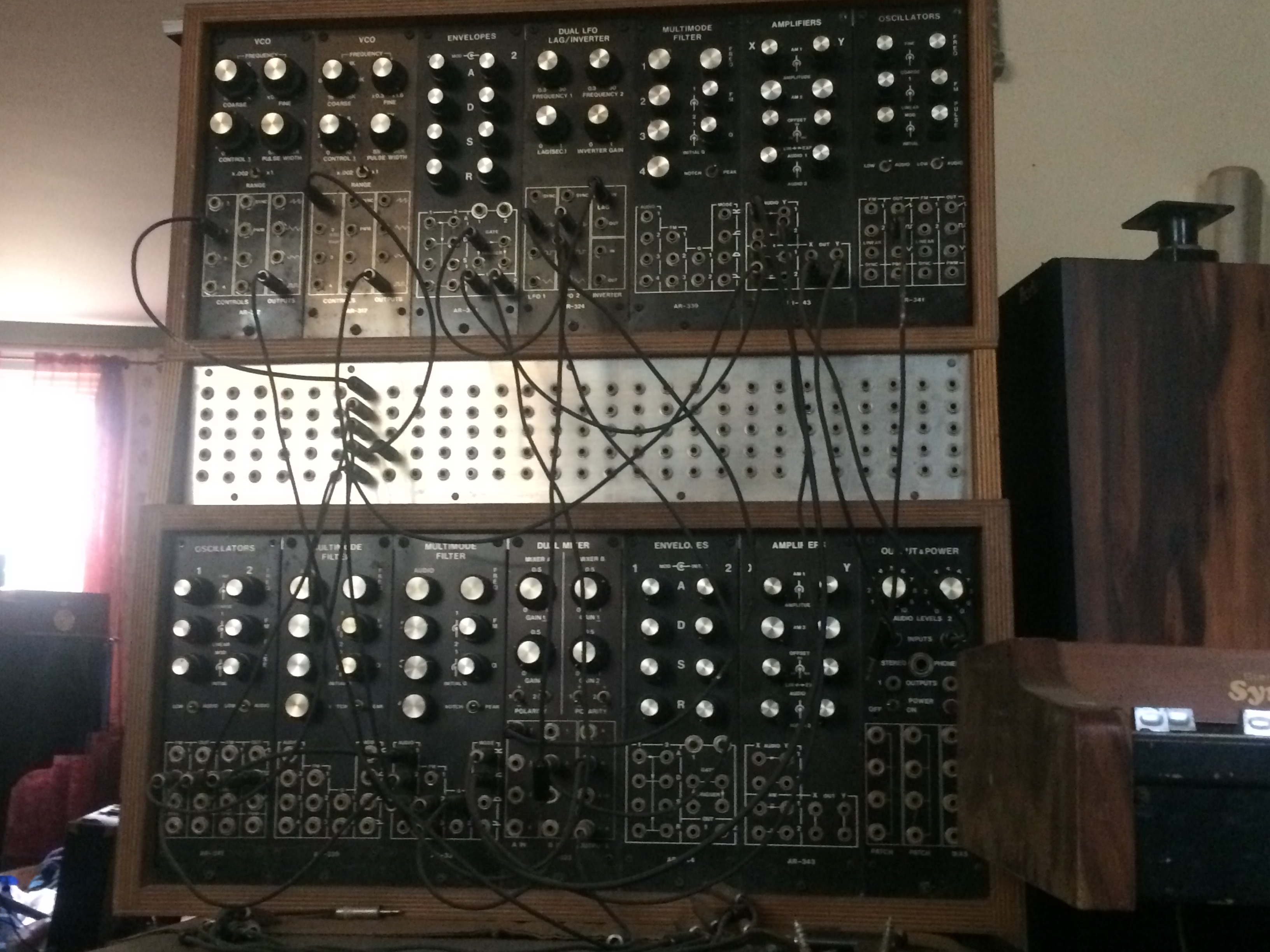 Aries System 300 in a walnut cabinet